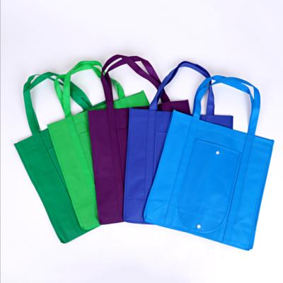 China Best Product Gift Packaging BIODEGRADABLE Foldable Nonwoven Bag With Pouch Snap Tote Bag for sale