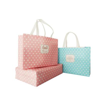 China Recyclable Beautiful High Standard Polka Dot Pattern Clothing Nonwoven Tote Bag High Quality Hot-Pressed Tote Bag for sale