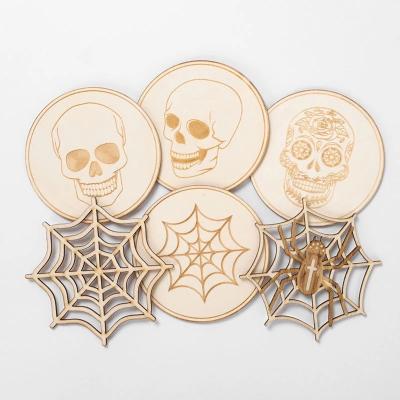 China Halloween Ghost Festival Coaster Sustainable Creative Pumpkin Felt Spider Web Skeleton Wood Carving Decorative Heat Insulation Pad for sale