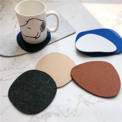 China New Hot Sale Felt Bowl Mat Polygon Placemat Creativity Stone Shaped Mat Irregular Insulation Pads Desktop Decoration Viable for sale