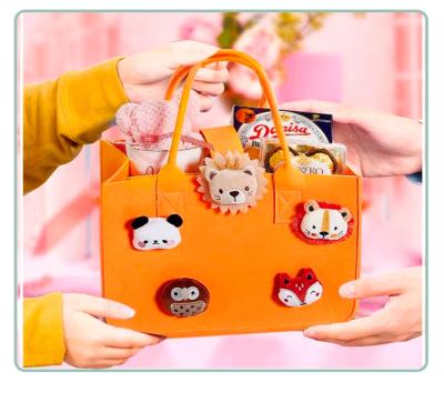 China Fashion Felt Hot Selling Gift Bag Custom Logo Handmade Cartoon Weding Gift Handbag for sale