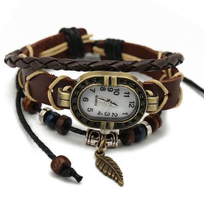 China Genuine Leather Women Leaf Decorative Vintage Alloy Quartz Bracelet Wrist Band Watch Women for sale