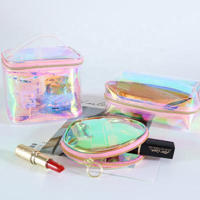 China Fashion Custom Clear Holographic Cosmetic Bags Transparent Makeup Bag Waterproof PVC Laser Makeup Pouch for sale