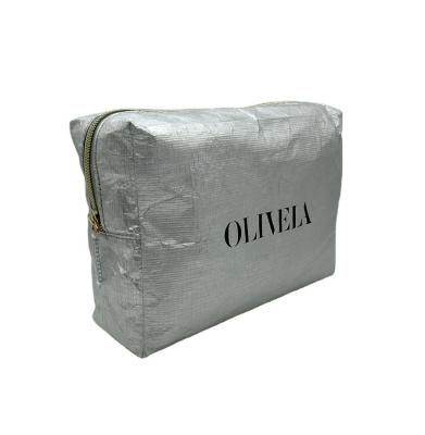 China Custom Washable Makeup Bag Women Travel Paper Fashion Packaging Storage Bag Zipper Cosmetic Organizer Bag for sale