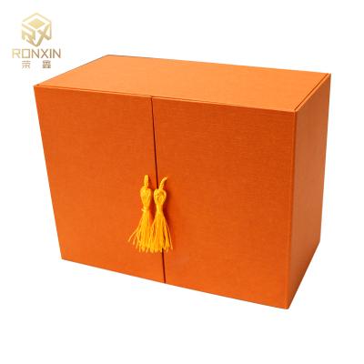 China Handmade Flap Lid Packaging Cardboard Bespoke Magnetic Closure Custom Gift Box Customized Makeup Ribbon EVA for sale