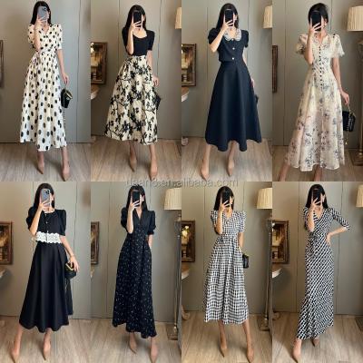 China Anti-wrinkle new 2023 summer waist slimming sleeve upper women's bubble flower skirt sense dress manufacturers wholesale for sale