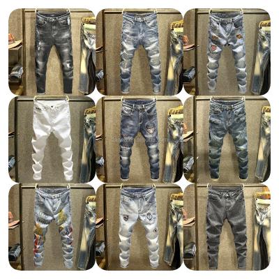 China Breathable Latest Fashion European Jeans Men Pencil Pants Casual Cotton Denim Ripped Holes Wholesale for sale