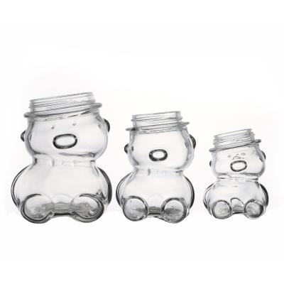 China KDG Food Factory 160ml 300ml Customize Flint Packaging Food Glass Jars Empty Bear Shaped Bulk Wholesale for sale