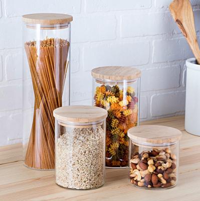 China High Borosilicate Transparent Food Storage Jars With Sealing Lid 250ml 500ml 750ml Bamboo Glass Food Jars for sale