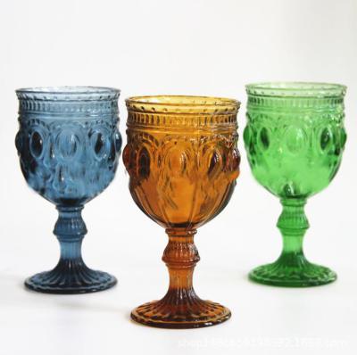 China Cheap Cup Colored Vintage Embossed Wine Glass Factory Stock Drinking Glass Wine Glass Goblet Glass for sale