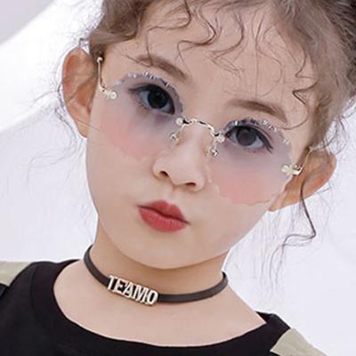 China Cute Fashion Sunglasses Queena Kid Round Frame Gray Pink Blue Lens Boys Girls UV400 Protection Rimless Eyewear 2020 Children Kids Sunglasses for sale