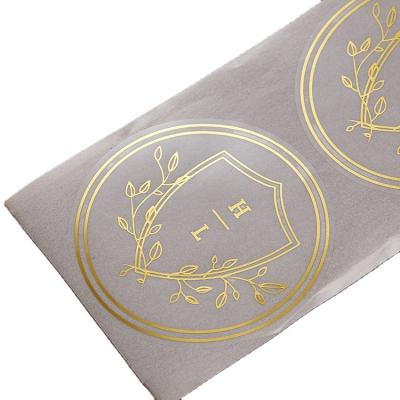 China Waterproof Screen Printed Heat Transfer Logo Self Adhesive Paper Sticker Colorful Labels Blank Glossy Packaging Labels For T-shirts for sale