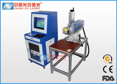 China Table Co2 Flying Laser Engraving Machine For Wood Plastic Bottle for sale