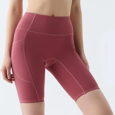 China Breathable Women High Waisted Yoga Shorts Workout Tummy Control Running Shorts With Side Pockets for sale