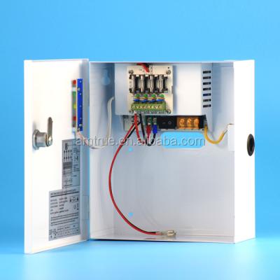 China Mains for cctv mini UPS 110v dc output cctv power supply in metal box with battery holder for sale