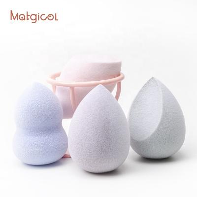 China Custom Latex Powder Waterdrop Non-latex Color Microfiber Makeup Blow Free Sponge With Stand for sale