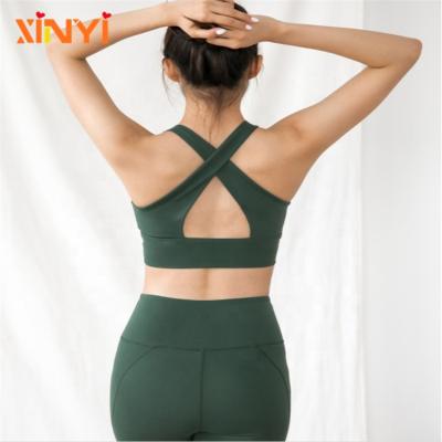 China Crossback gym women sports antibacterial running bra compressed yoga sports bra with removable bust cups inside active wear wholesale for sale