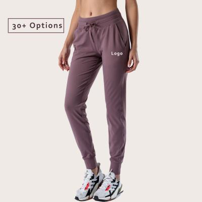 China QUICK DRY Delivery Women's Quick Jogger Suits Women's Elastic Band Gym Pants Sweatpants Women's Running Jogger for sale