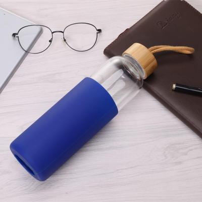 China 2019 Viable New Design Sport Cartoon Glass Special Glass Water Bottle Bamboo Lid Custom Logo Bottle Maker for sale