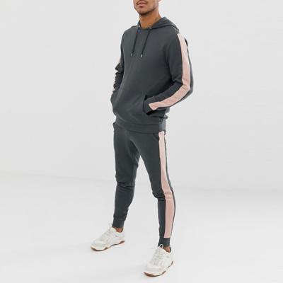 China Sustainable Wholesale Tracksuit Man With Sleeves Stripe Tracksuits Customized In New Style for sale