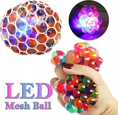 China Bulk Grape Mesh Squishy Balls LED Toys Anti-Anxiety Toys Squeeze Balls Eco-Friendly Squeeze Squishy Ball for sale