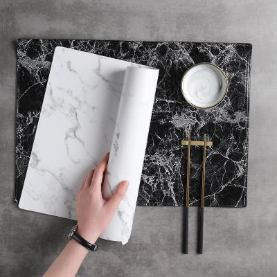 China Viable Wholesale Custom Waterproof Table Mat Cup Coaster Anti-oil Heat Insulation Place Mat Logo Marble Pattern Leather Table for sale