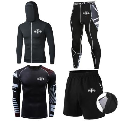 China Breathable sports suits running four-piece men's fitness quick-drying T-shirt short-sleeved sports clothes for sale