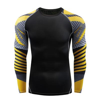 China Breathable Compression Running Shirt Men Fitness Long Sleeve Sports Gym Set for sale