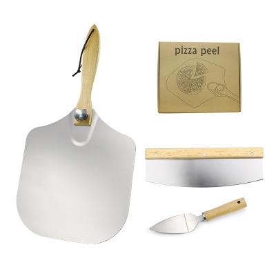 China Dropshipping Viable Pee Baking Pizza Cutter Rocker Spindle Shovel Aluminum Wooden Handle Pizza Kit Tools Set Foldable Perforated for sale