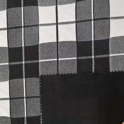 China Antistatic Wholesale Polyester Spandex Crepe Jacquard Checks Knit Fabric For Garment for sale