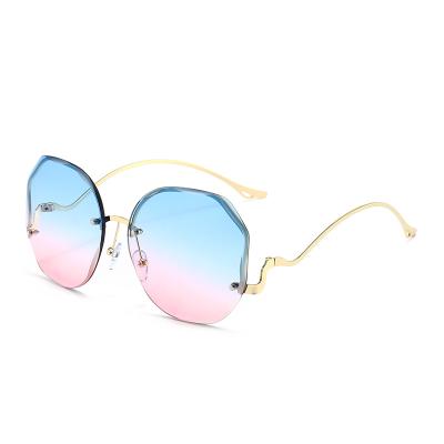 China High Quality Balanced Rimless Butterfly Flower Sunglasses Fashion Trend Ocean Film Gradient Sunglasses New Fashion Sun Glasses for sale