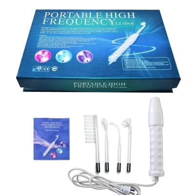 China Portable Handheld 4 In 1 Multifunction Portable Facial Wand High Frequency Skin Therapy Machines for sale