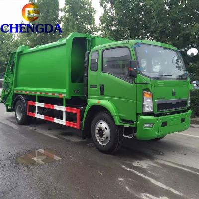 China Garment Shops Howo Garbage Truck Price Compactor Collecting Truck 4x2 Garbage Howo Garbage Truck for sale