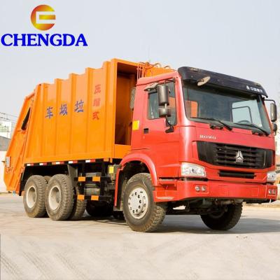 China Garment Shops Howo Garbage Truck Price Compactor Collecting Truck Howo Garbage Truck for sale