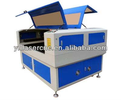 China Laser CUTTING YN1490 CO2 laser cuter for wood/advertising/cloth/rubber/leathe etc.with high precision and good price for sale