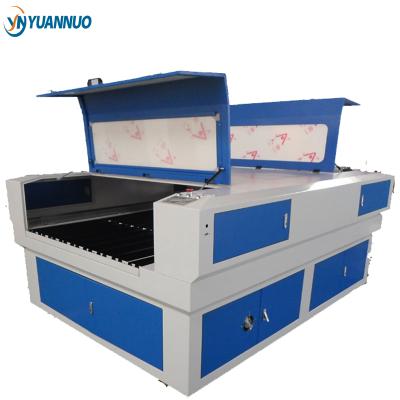 China YN1318 15mm Water Cooled MDF Laser Cutting Machine Price For Sale MDF Fabric Acrylic Rubber Leather Wood for sale