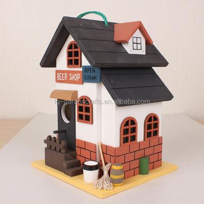 China Handmade Indoor Cottage Sustainable White Wooden Outdoor Hanging Bird House for sale