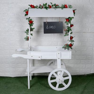 China Sustainable Floor Tier Soft Decoration Window Cool Chalkboard Flower Stand Decoration With Wheel for sale