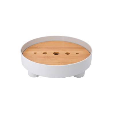 China Universal Desktop Tea Table Storage Small Round Drain Tea Tray For Home for sale