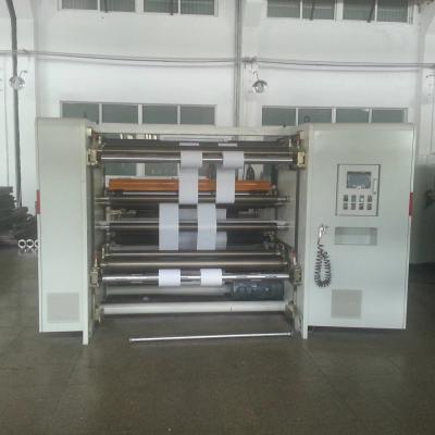 中国 Fully Automatic Three Motor Foil Rewinding Machine Paper Rewinding And Slitting Machine 販売のため