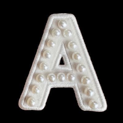 China Handmade New Design Custom Bead Letter Embroidery Iron On Patches For Bags for sale