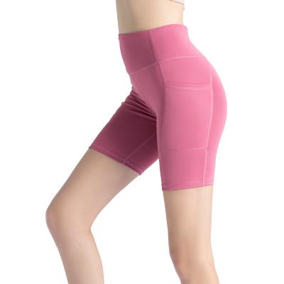 China Breathable Breathable Elastic Shorts With Pocket Yoga Sports Fitness Women Tight Shorts For Gym Running Cycling for sale