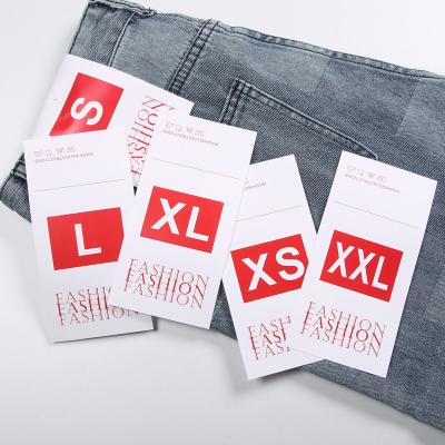 China Custom Viable Recyclable Paper Garment Folding Tag Waist Card Jeans Waist Card Back Pocket Tag With Brand Logo for sale