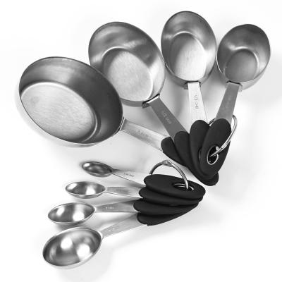 China Sustainable Set of 8 Piece Stainless Steel Measuring Cups and Dosers with Colored Silicone Handle for sale