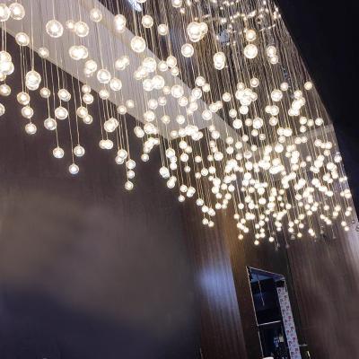 China Guzhen Modern Factory Customize Long Round Glass LED Chandelier For Cloth Shop for sale