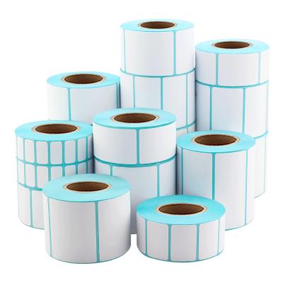 China OEM/ODM Self Adhesive White Paper Sticker Custom White Labels Rolls Self Adhesive Custom White Blank Printer Sticker for sale