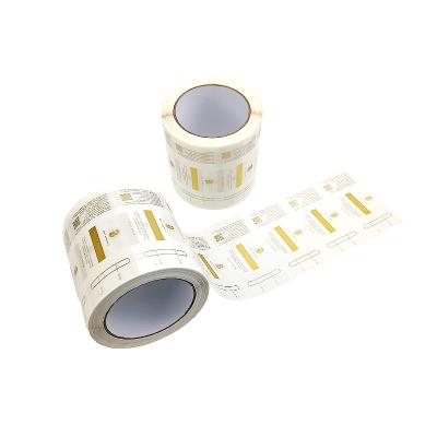 China 2022 label printing trend embossed gold foil shiny adhesive sticker transparent self-adhesive transparent packaging custom label stickers for sale