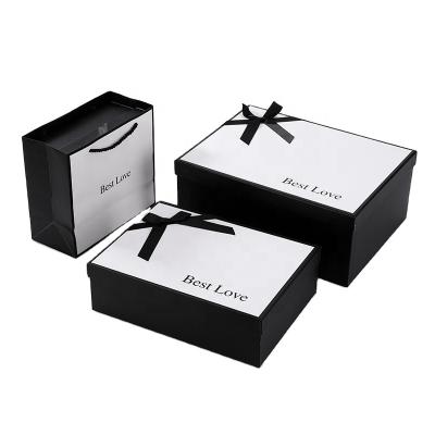 China Recycled Paper Gift Box Custom Logo Luxury Black Packaging Materials And Paper Packaging Factory for sale