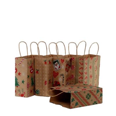 China Whosale Custom Recycled Paper Gift Bag Packaging Materials For Party Brown Merry Christmas Decorative Paper Bags for sale