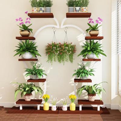 China Modern minimalist living room display metal shelf balcony flower stand wedding decoration wooden display stand for sale